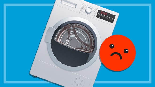 clothes dryer with unhappy face emoji